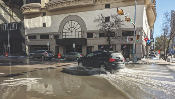 Flooded intersection in Austin, Texas during the thaw following the February 2021 snowstorm. Photo credit: JNO.ASKINNER