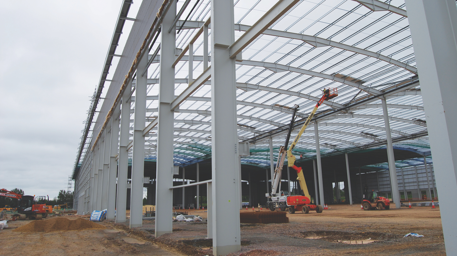 A major distribution centre for retailer Co-op in Biggleswade, Bedfordshire, features a steel portal structural design with spans of 36m and a maximum height of 15m. Caunton Engineering, working with main contractor Winvic, erected 2.5 tonnes of steel for the 61,409 sq m facility, while separate recycling and maintenance buildings have 28m-wide and 26m-wide spans respectively. Photo supplied by New Steel Construction