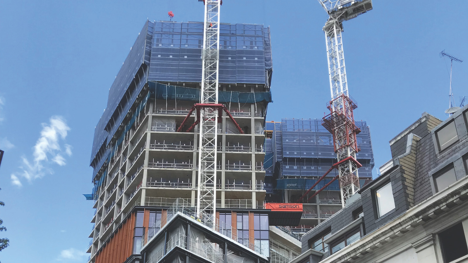 Work on the towers’ envelope starts, June 2019