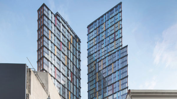 The cladding on the other side of the towers uses screen-printed glass panels. Photo credit: Agnese Sanvito