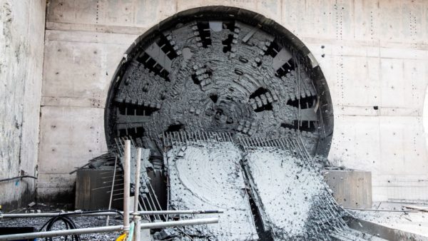 The TBM as it breaks through the wall of the reception box on the south side of the Long Itchington Wood tunnel on HS2.