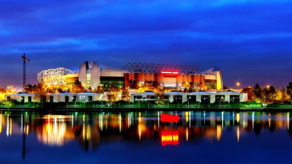 Manchester United's Old Trafford stadium at dusk