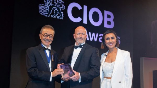Construction Manager of the Year Joe O'Connell (centre), with CIOB president Michael Yam (left), and TV presenter Anita Rai