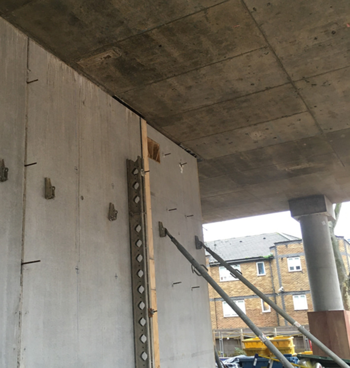 Non-loadbearing prefabricated RC ‘twin-wall’ panels require early review and approval of steel bracket connection and associated fire proofing/stopping.