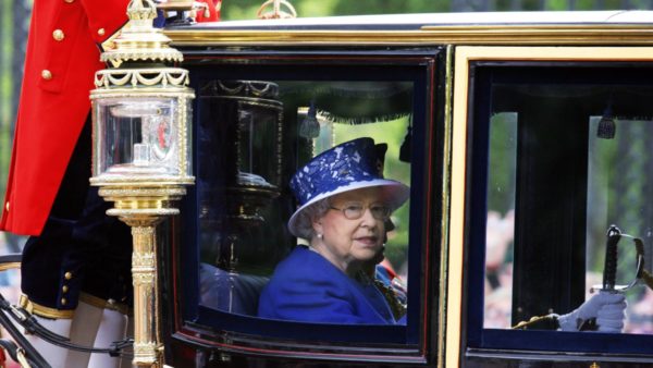 Queen Elizabeth II on the Royal Coach (Image: Dreamstime)