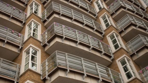 A view of balconies and windows in a block of flats.