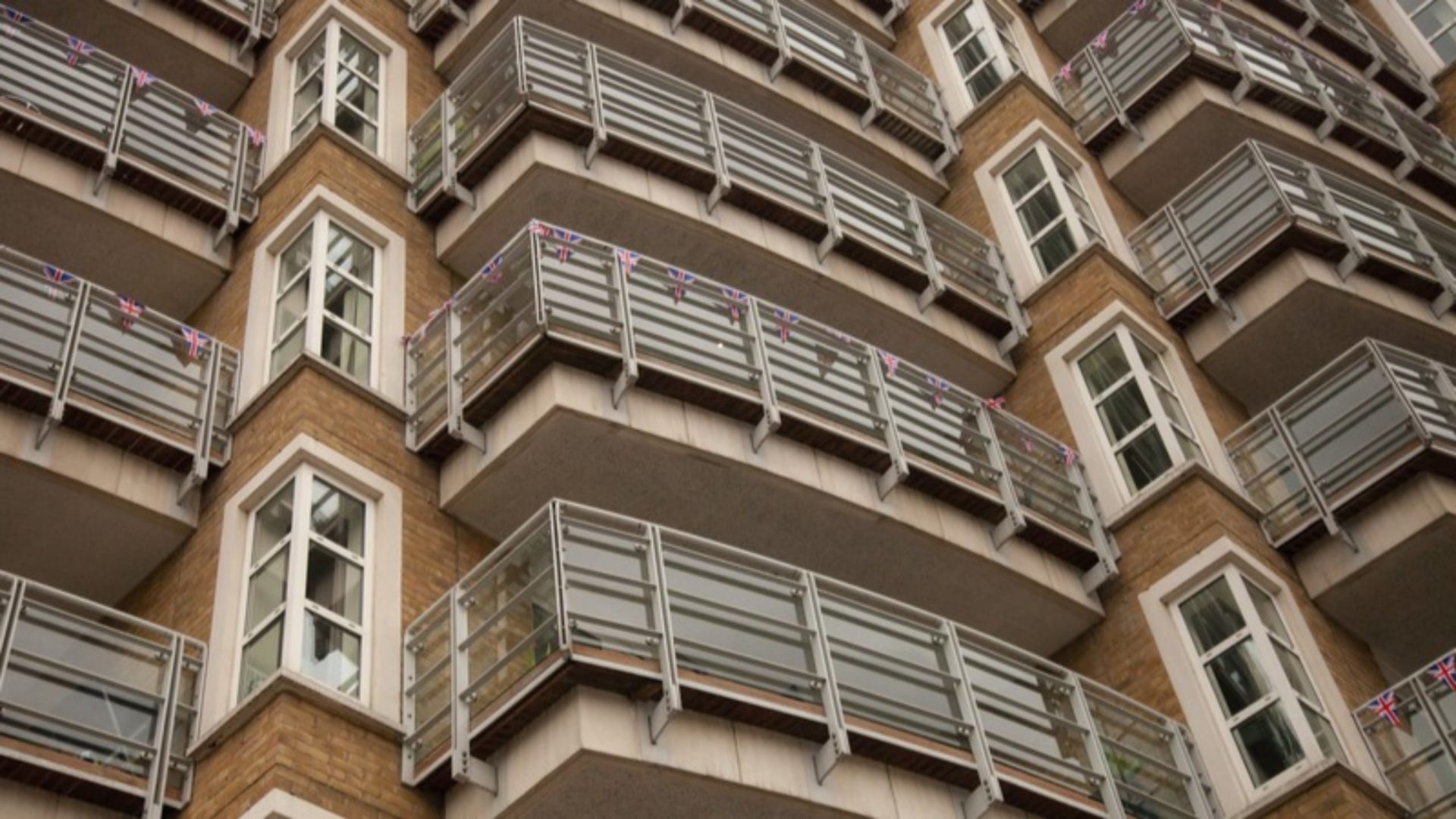 Building Safety Regulator A view of balconies and windows in a block of flats.