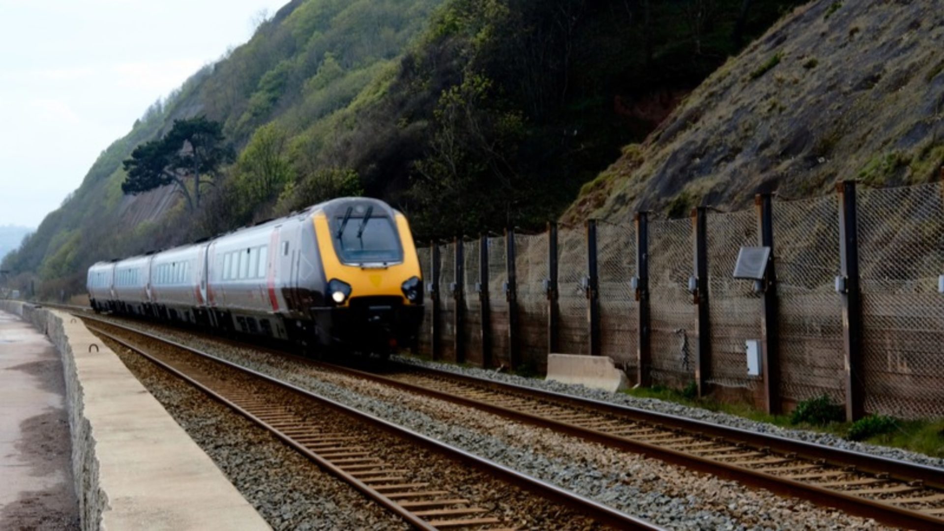 Near miss incident - A train on rail tracks.