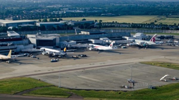 Aerial view of planes parked at Terminal 4 of London`s Heathrow Airport on a sunny summer morning. Aircraft from Malaysia Airlines, Qatar Airways, Jet and Gulf Air are seen