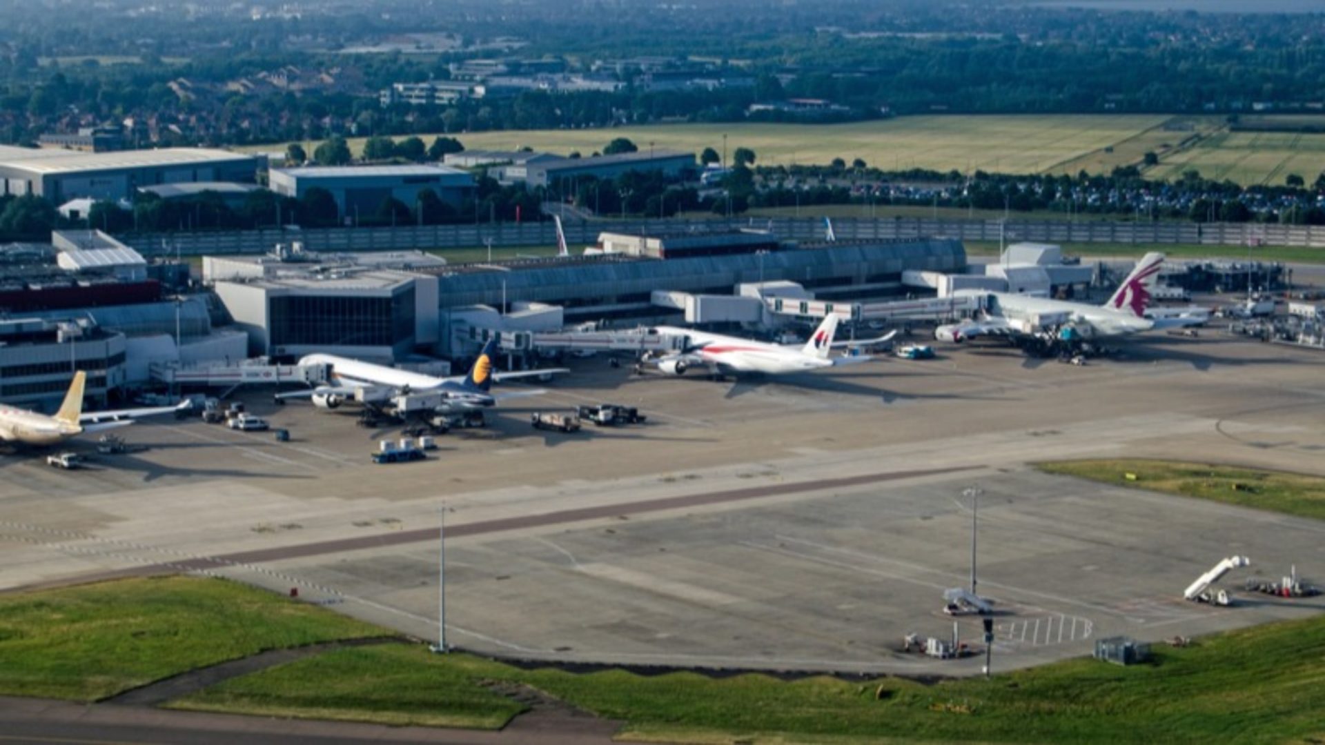 Ferrovial worker dies - Aerial view of planes parked at Terminal 4 of London`s Heathrow Airport on a sunny summer morning. 