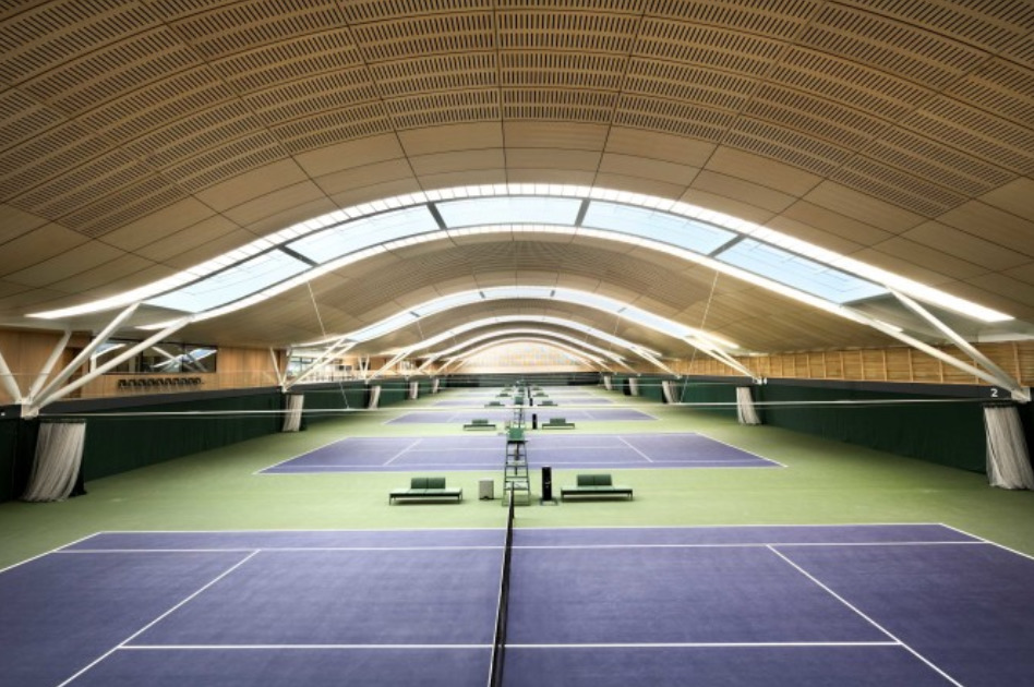 Wimbledon tennis complex - A view of an indoors tennis spots centre with tennis courts.