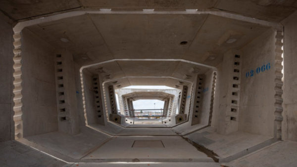View of the inside of a giant concrete viaduct factory.