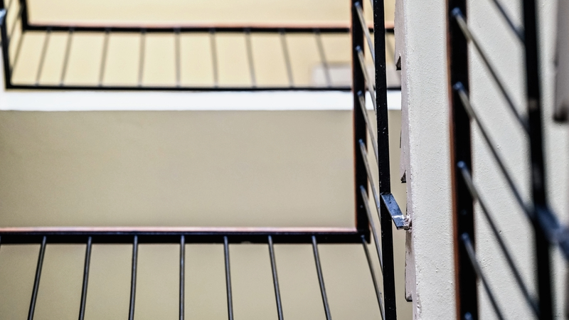 second staircases - View of a staircase with railings from below.