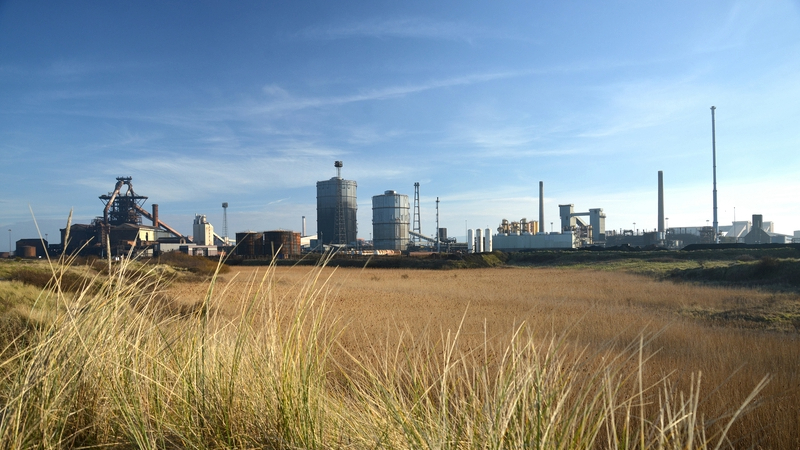 Teesworks blast - Derelict steel workds buildings in a field.