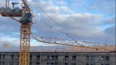 A crane that has collapsed on a construction site