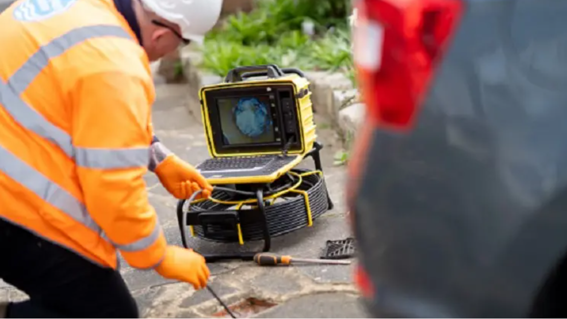 Cappagh concrete - Engineers using camera equipment to inspect a sewer.