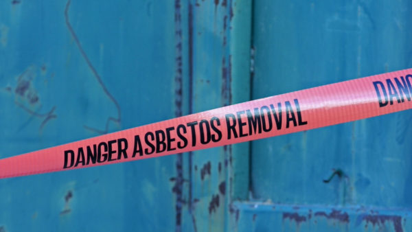 A red tape with 'danger asbestos removal' on it