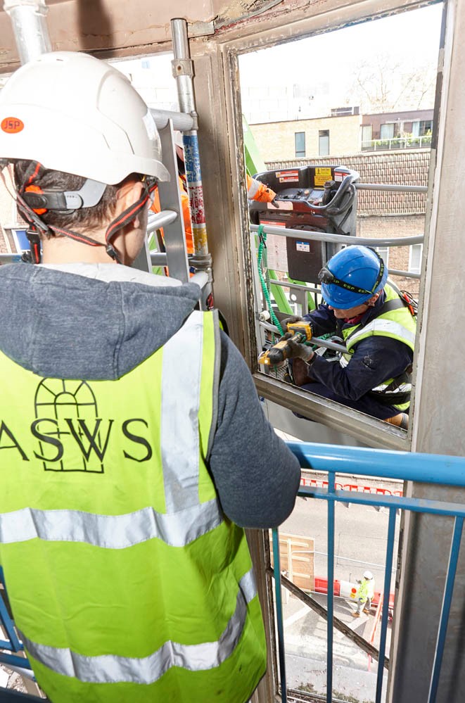 The ASWS team installing the new windows at Whiteleys. Whiteleys shopping centre