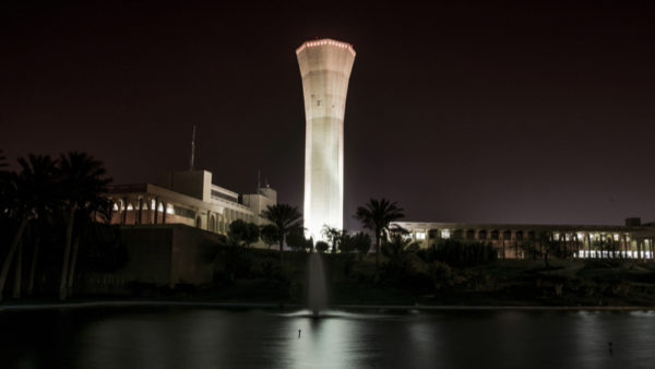 Night view of the Clock Tower of the King Fahd University of Petroleum & Minerals. Researchers at that university are working with Northumbria University academics to understand how artificial intelligence can make construction greener.