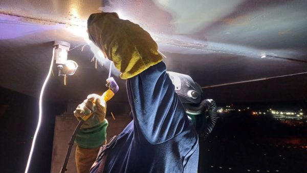 Welding repairs carried out on the underside of the bridge box section of Avonnmouth Bridge
