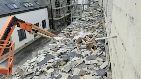 Asbestos debris was scattered across the site. A director was fined after workers exposed to asbestos during hotel demolition.