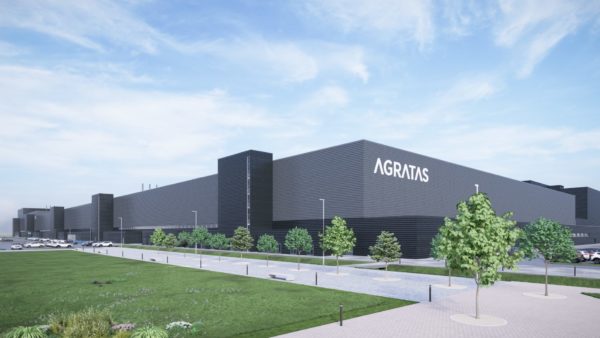 Visualisation of Building One showing a big low black building with the Agratas logo on it.