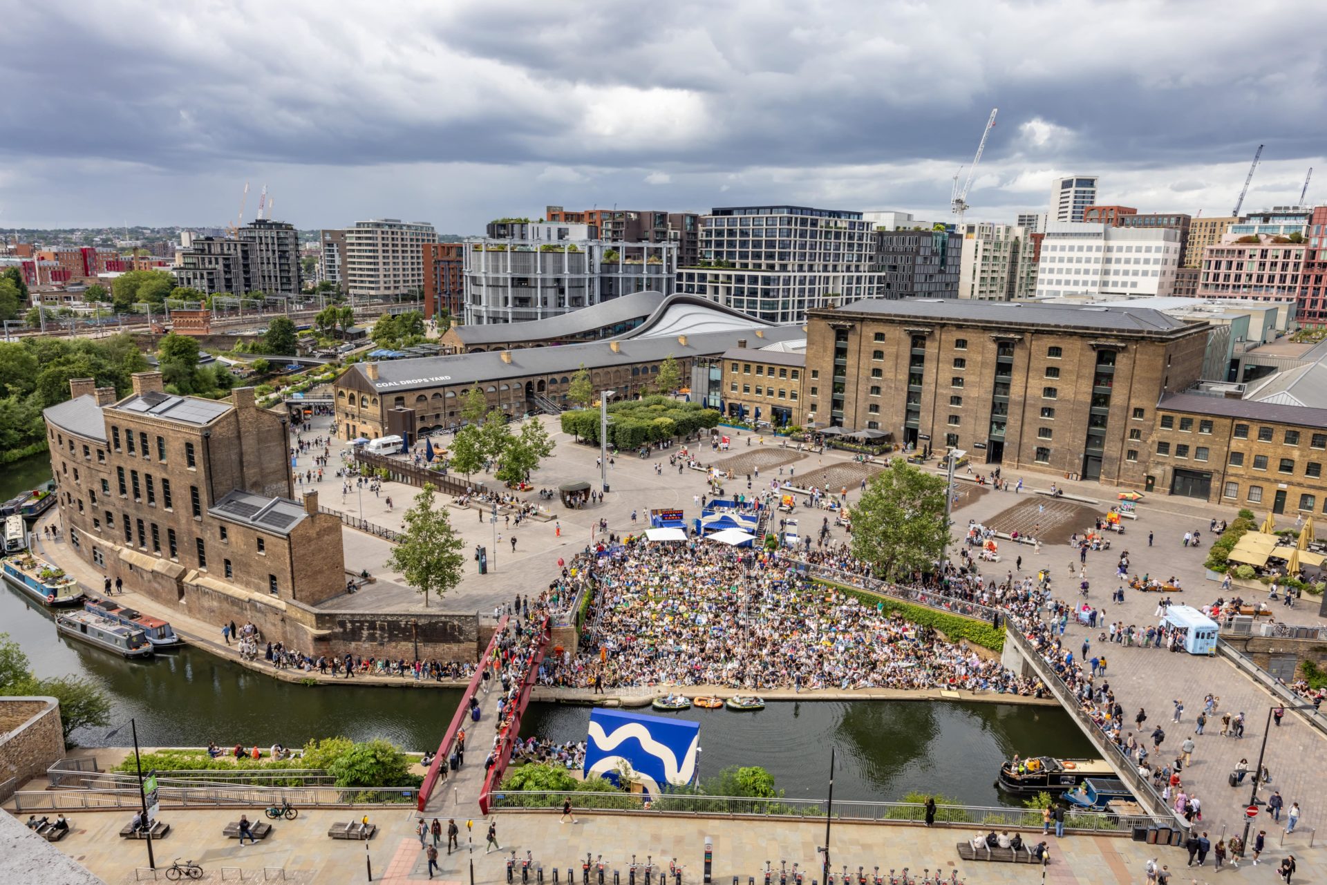 View of the King's Cross Masterplan. Looking north over the Canal to Granary Square and Central St Martins art school (right) and Coal Drops Yard (left)