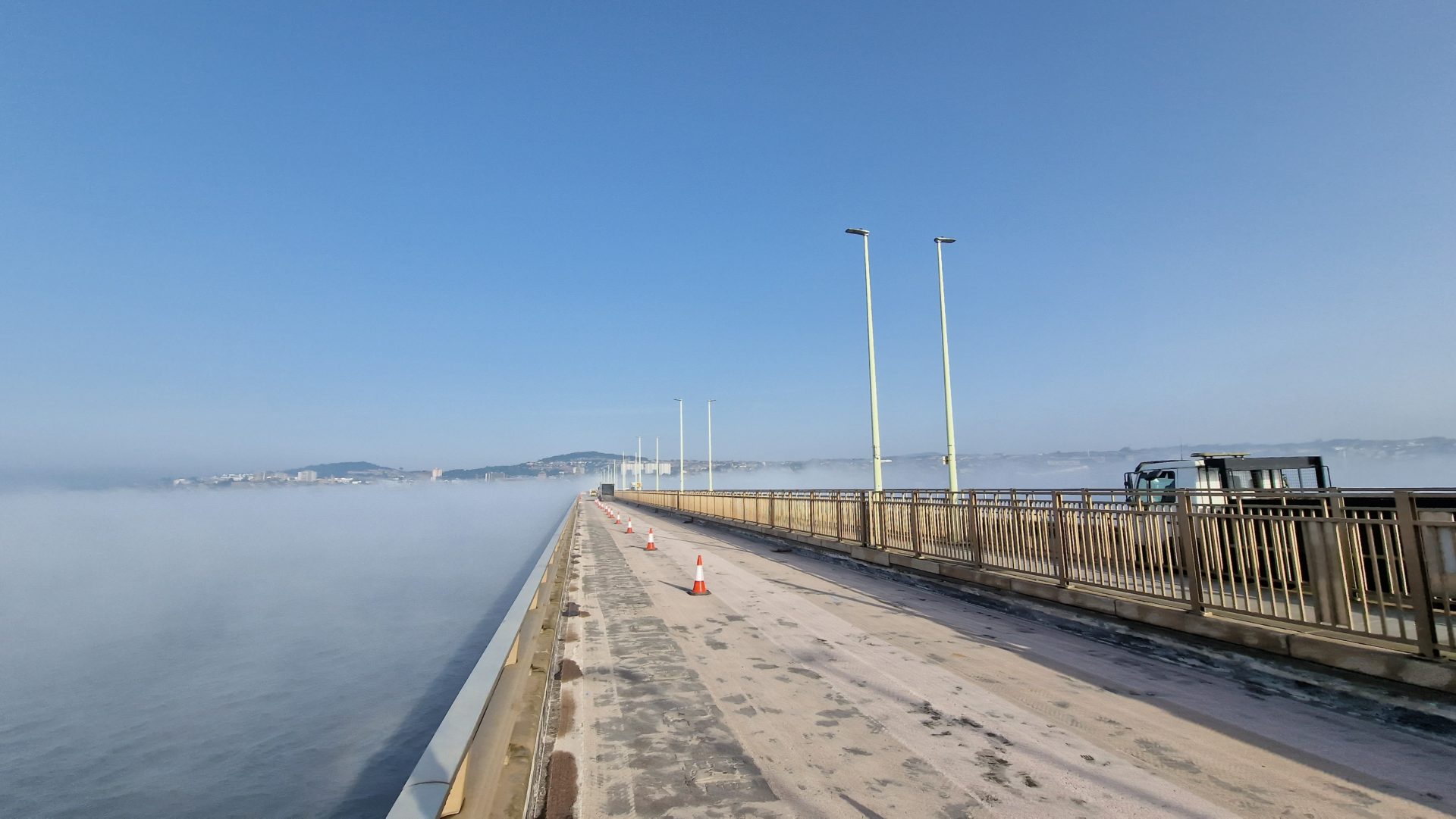 A road requiring maintenance by the seaside 