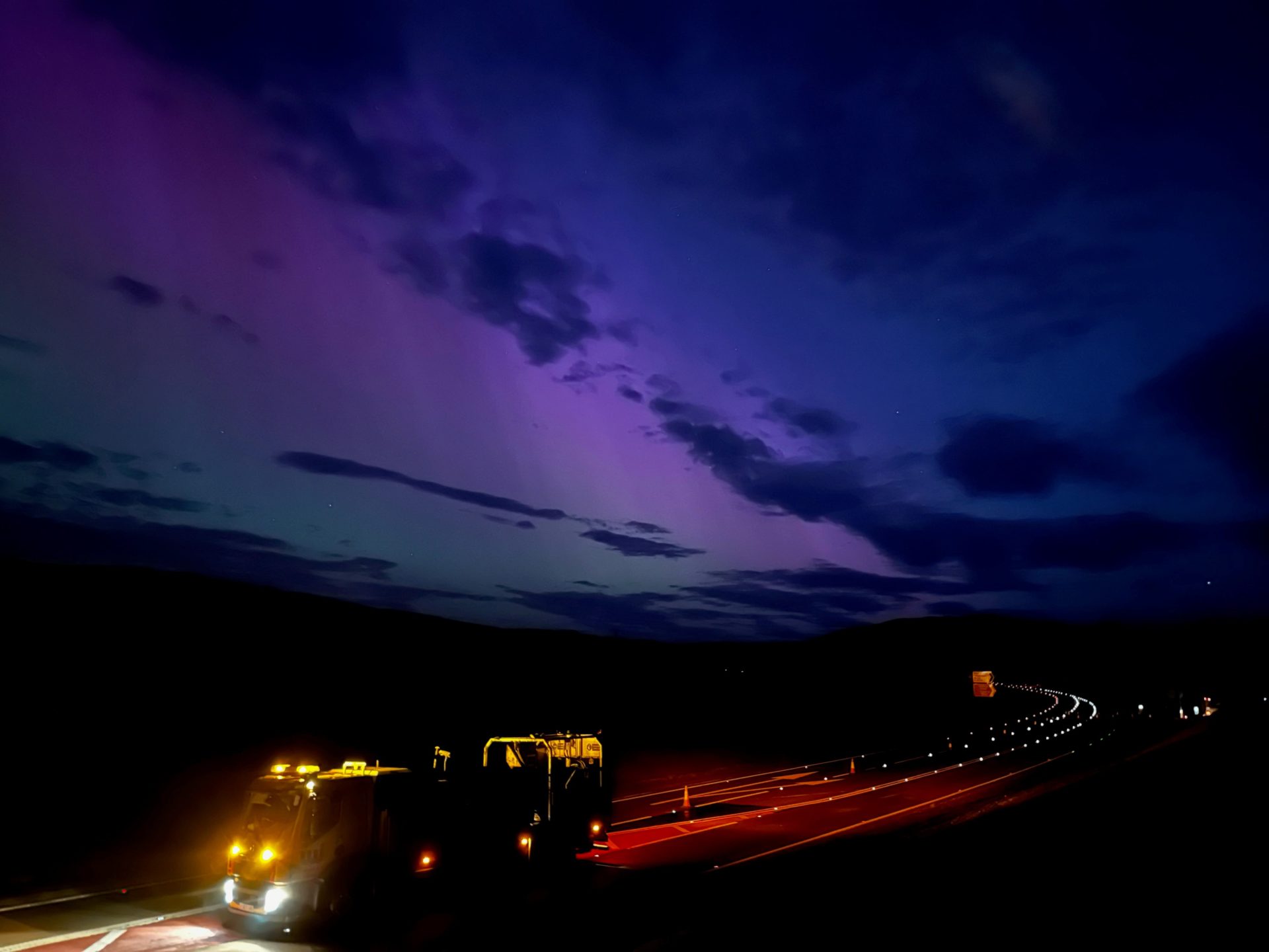 A truck carrying out road maintenance at night - WJ Group is showcasing photos taken by its workers to encourage more people into the sector.