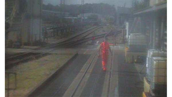 Forward-facing CCTV image of the shunter walking on to get to the main shed building.