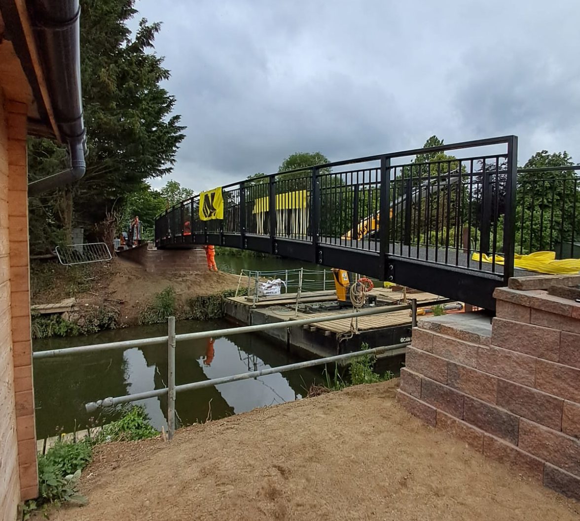 Now installed, the new bridge and support ramps.