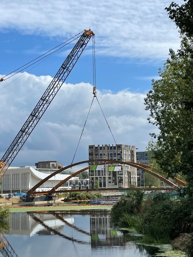 The Chelmer Waterside bridge being lifted into position by Graham