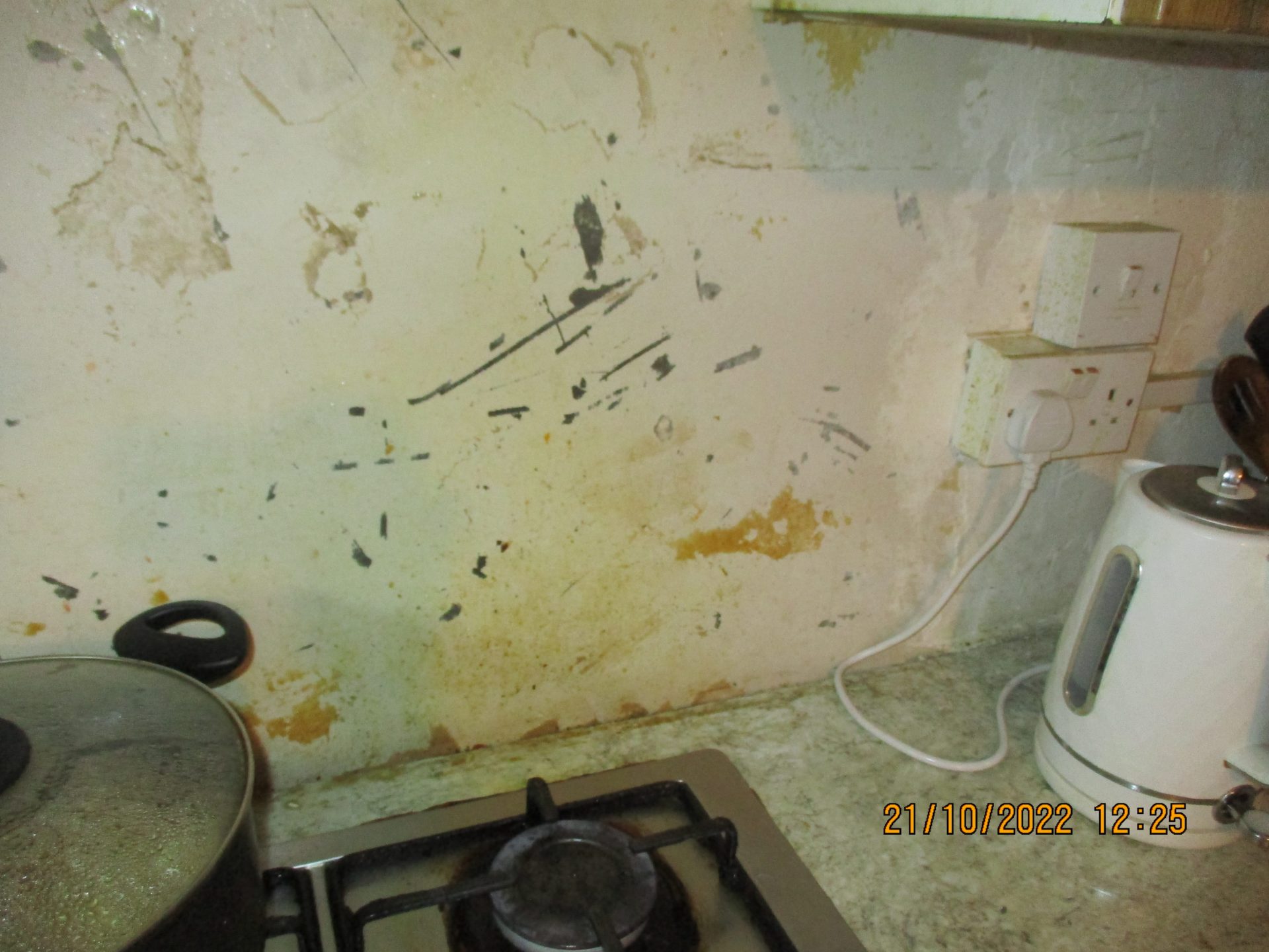 The kitchen in the house in multiple occupation. It looks dirty and in very bad state.