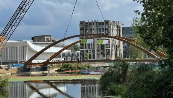 The Chelmer Waterside bridge being lifted into position by Graham