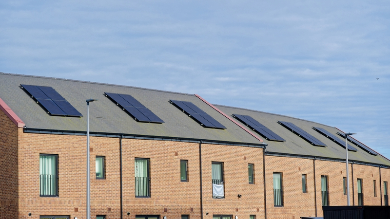 A row on new terraces houses with solar panels on their roofs. The Construction Industry Council is calling government for a stronger approach to retrofit in its planning reform plans.