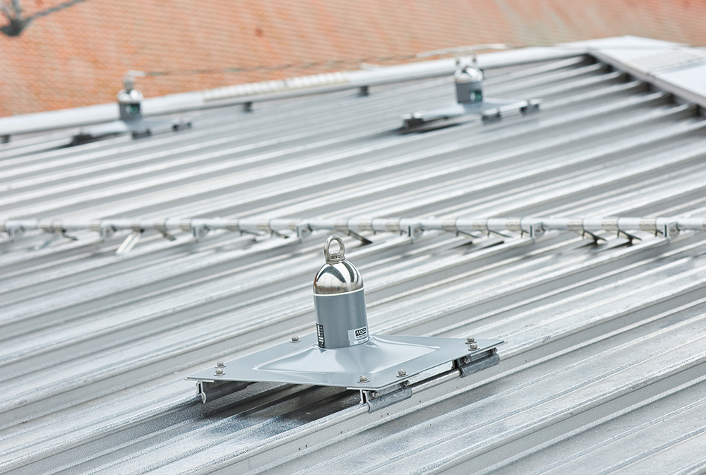 A ridge system uses additional single-point anchor posts to gain access to roof corners (MSA Safety)