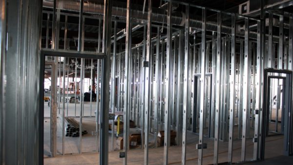 Light gauge metal stud framed walls located within a structural steel building - The British Constructional Steelwork Association has launched a national light-gauge steelwork specification