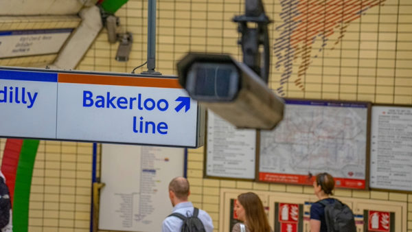 Bakerloo Line sign next to a Picadilly Line sign in a tube station - The Bakerloo Line extension is progressing after TfL has appointed consultants for a feasability study.