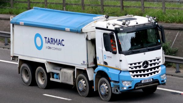 A lorry on the road with the Tarmac logo.