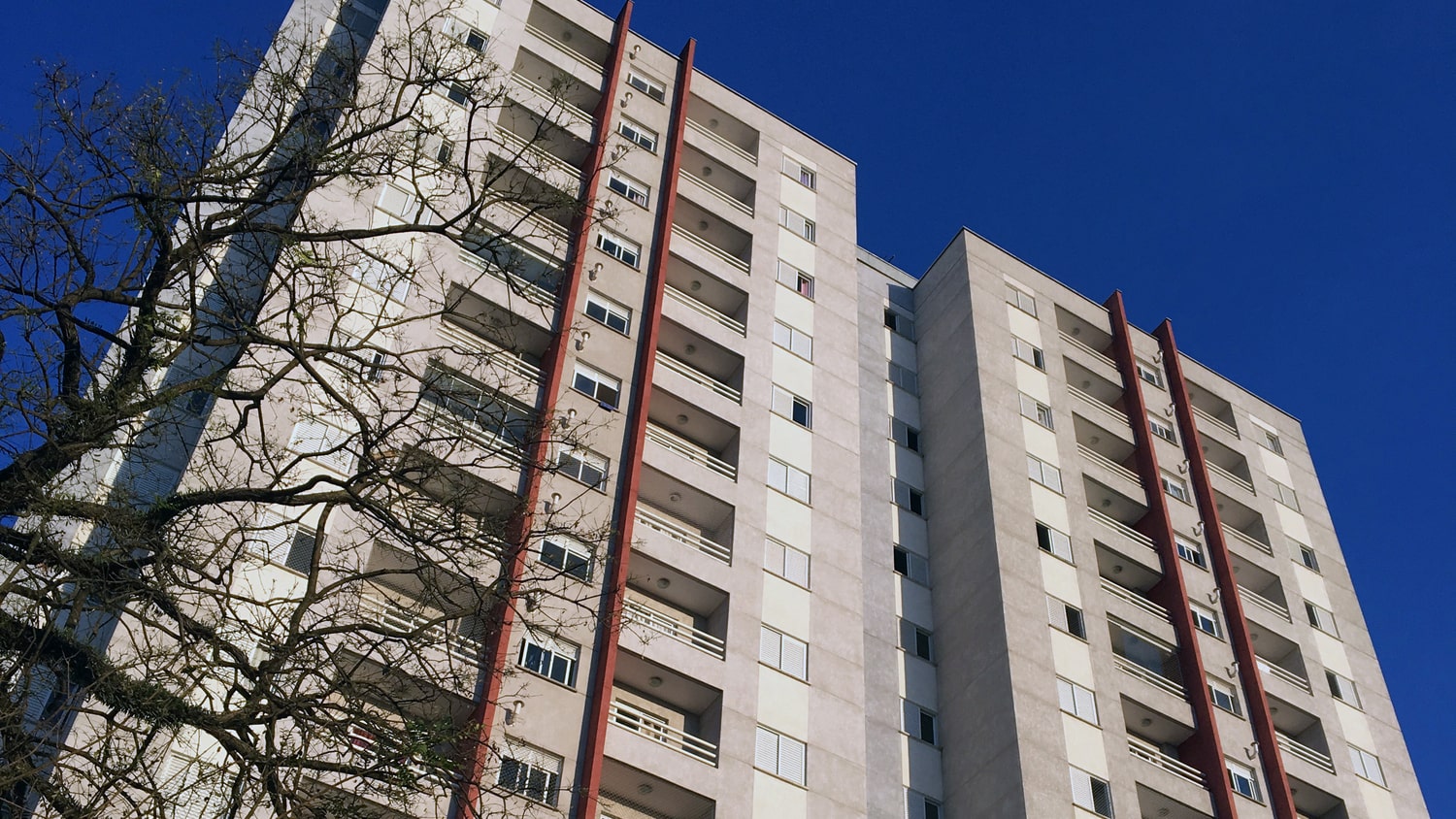 View from below of a high-rise residential building - Fusion21 is inviting bids for £800 million Building Safety and Compliance Framework