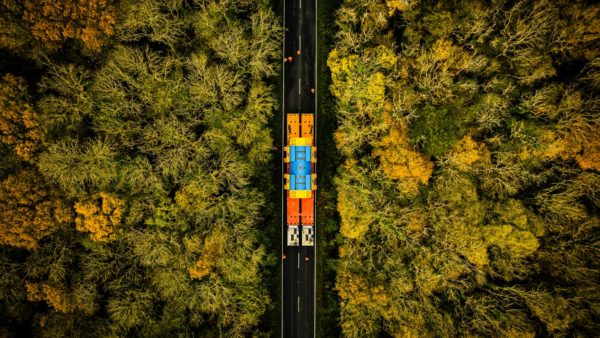 Aerial view of the new stator generator arriving at Hinkley Point C by road.