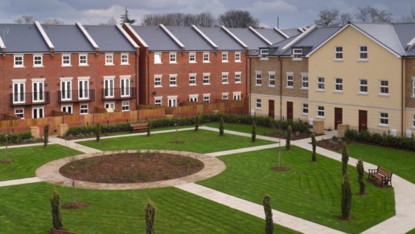 A modern style terrace town house property development - Muse has signed a long-term public-private partnership with Homes England and the Pension Insurance Corporation to built 3,000 low-carbon homes for rent