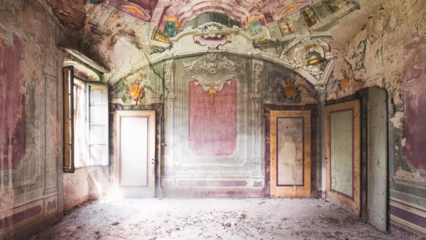 A spacious room with frescos in an abandoned school in a remote Italian village. The photo is one of the finalists in the Art of Building photo competition.