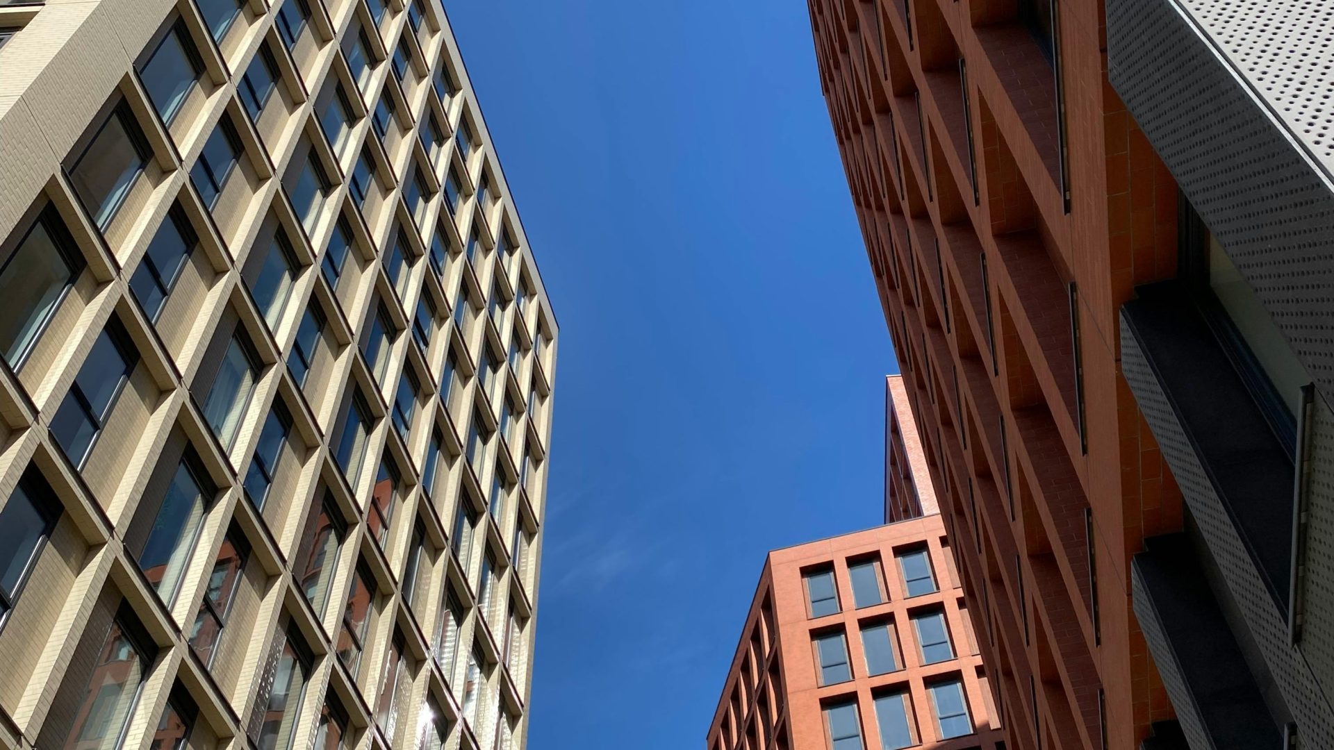 Gateways process - View from the ground of three modern high-rise residential buildings - in this article, John Forde explains how to deal with delays in the Gateways process.