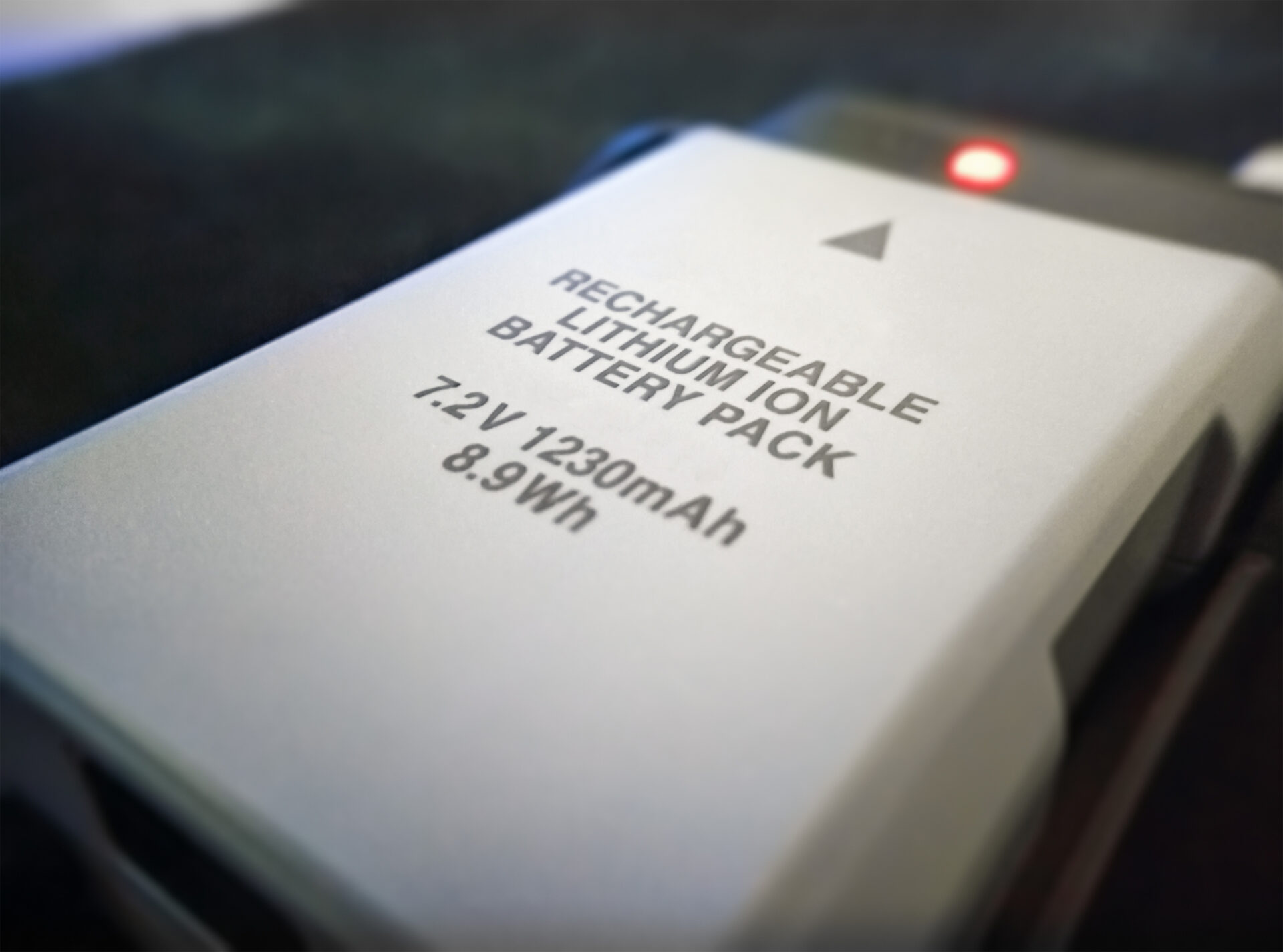 Lithium Ion Rechargeable Battery on a Charger - safety experts are warning about the risks of these batteries in construction