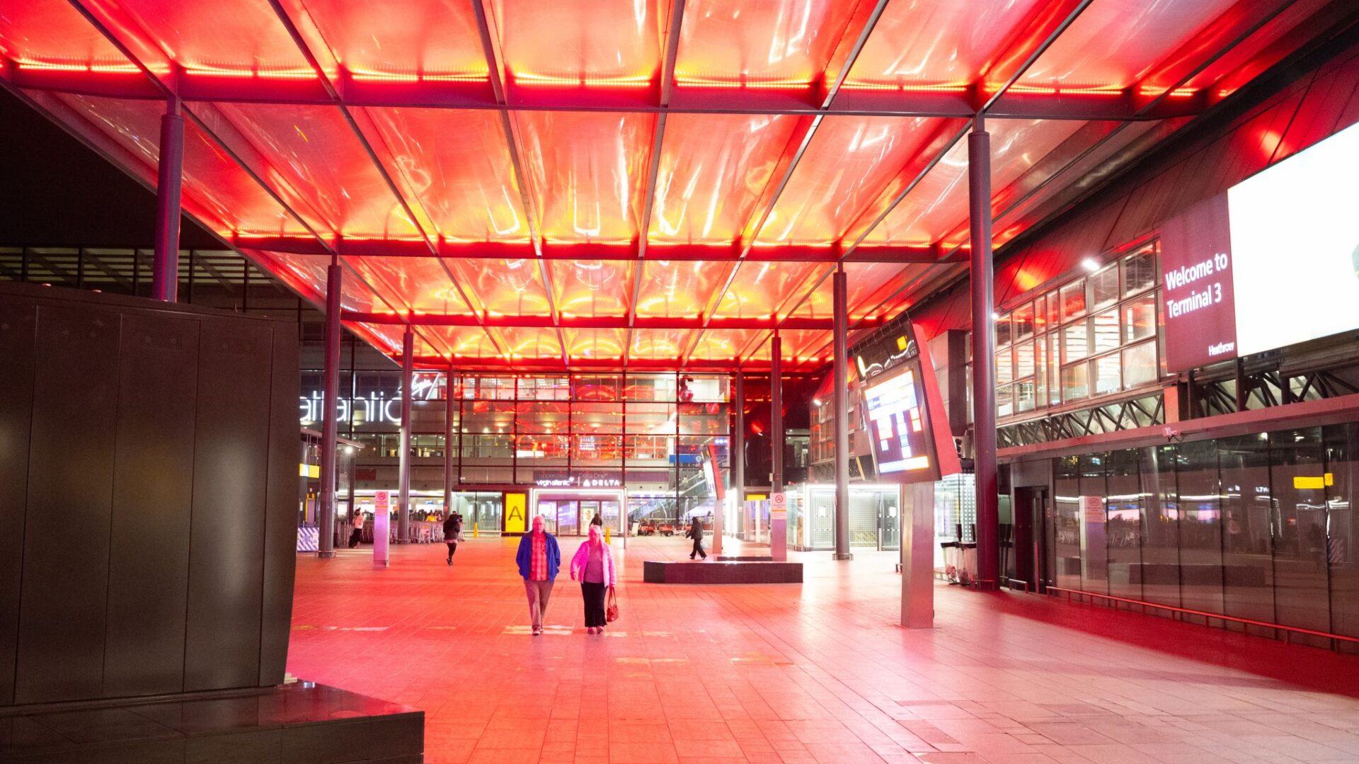 Mace turns ‘red’ for children in care and young care leavers - a terminal of Heathrow airport lit up red at nighit