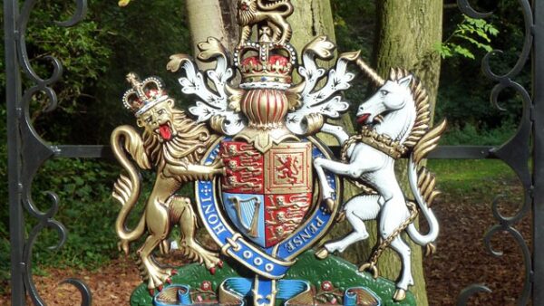 The royal coat of arms on a gate - DBR has been awarded a warrant of appointment by the King.