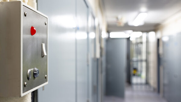 Close up of a switch in a prison corridor - Galliford Try has been awarded a major fire safety improvement contract for a Category C prison