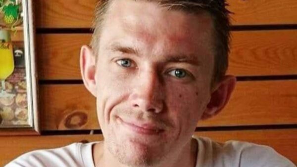 A young man smiling at the camera - Piper Homes has been fined £300,000 after a young worker was crushed to death by concrete blocks.