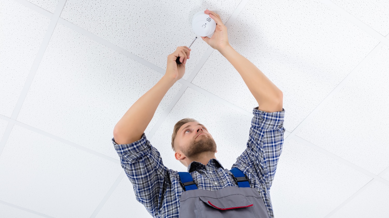 Possibly there’ll be a little less of this with Honeywell’s new self-testing smoke detectors (image: Andrey Popov | Dreamstime.com).